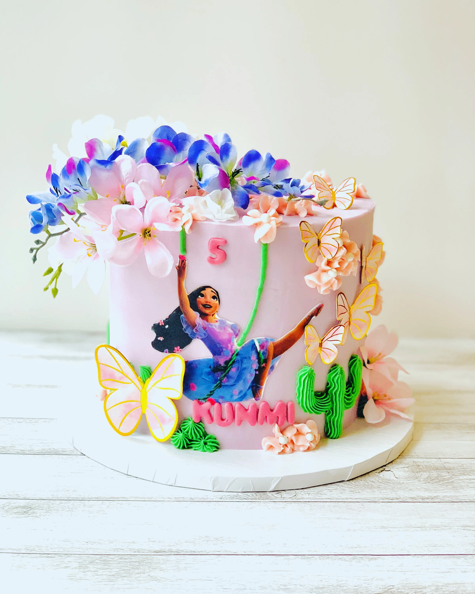 Homemade buttercream layer cake with lavender and rose petals